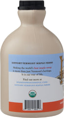Hidden Springs Maple handcrafted Vermont syrup bottle featured on rustic surface.
