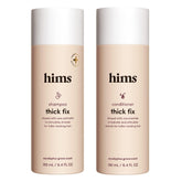 hims Thick Fix shampoo bottle closeup for refreshing scalp cleansing.