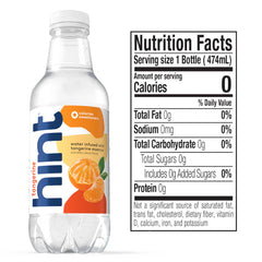 Hint fruit-infused water tangerine pour in glass suggests refreshing flavor without sugar