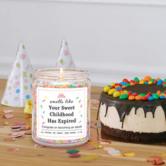 Homsolver vanilla birthday cake scented candle with sprinkles.