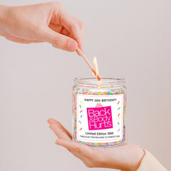 Homsolver vanilla-scented candle burning to create a calm indoor ambiance.