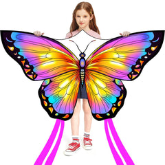 Honbo butterfly kite pink in flight at the beach for family fun.