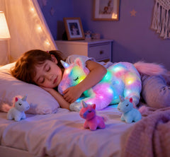 Hopearl mommy unicorn tummy opens to reveal three babies for interactive storytelling.