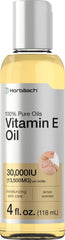 Horbaach Vitamin E Oil bottle moisturizes and nourishes skin.
