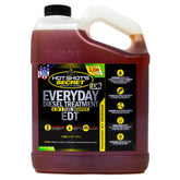 Hot Shot's Secret EDT bottle being poured to boost cetane and efficiency.