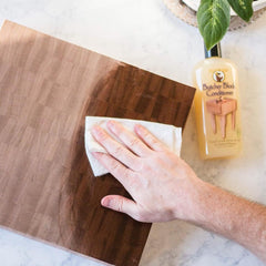 Howard butcher block oil label closeup highlights vitamin E protection.