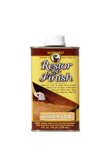 Howard Restor-A-Finish Golden Oak 8 oz bottle pouring for quick touch-ups and color restoration.