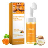 HOYGI turmeric face wash with brush bottle for gentle daily cleansing.