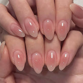 HPYFOI Pink Aura press-on nails in short almond shape for quick at-home manicure.