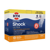 HTH 52040B Shock Ultra bottle pour showing quick dissolution for clearer pool water.