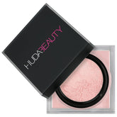 Huda Beauty Easy Bake Cherry Blossom packaging signals premium makeup prep.