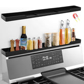 Hugro Tarfive 30-Inch magnetic shelf organizes spices on a flat stove.