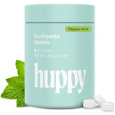 HUPPY Toothpaste Tablets in sustainable tin packaging for travel-friendly brushing