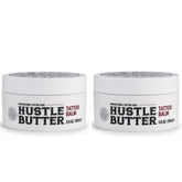 Hustle Butter Deluxe tattoo balm jar close-up showing natural ingredients for aftercare