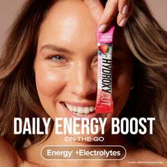Hydroxycut Wildberry Blast bottle with packets showing on-the-go energy options.