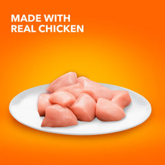 Close-up of tender chicken cuts in rich gravy in IAMS Perfect Portions.