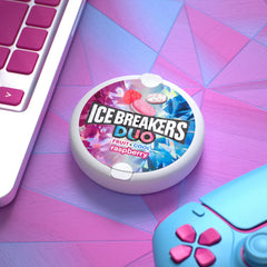 Ice Breakers Duo Raspberry mints in a car cup holder for quick refresh.