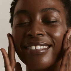 ILIA The Base Face Milk Essence on skin shows smoother, calmer appearance