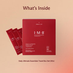 IM8 Daily Ultimate Essentials being poured into a glass for quick daily nutrition
