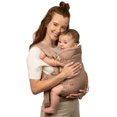 Infantino Flip Luxe 4-in-1 convertible seat enhances infant to toddler carrying comfort.