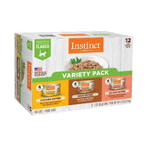 Instinct Flaked Entrée variety pack cans shown together for cat servings, high-protein option