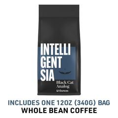 Macro view of glossy, evenly roasted Intelligentsia Black Cat Analog beans.