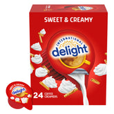 International Delight coffee creamer singles box, 24-pack, travel-friendly sweetness.
