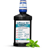 ioRinse AC bottle front with mint label highlighting enamel protection and gentle, alcohol-free formula.