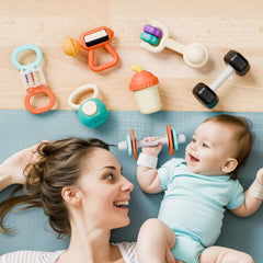 iPlay iLearn sensory stroller toy encouraging hand-eye coordination during playtime