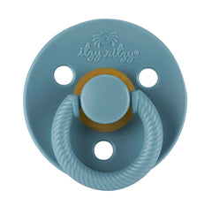 Itzy Ritzy natural rubber pacifier Coast with large air holes for airflow.