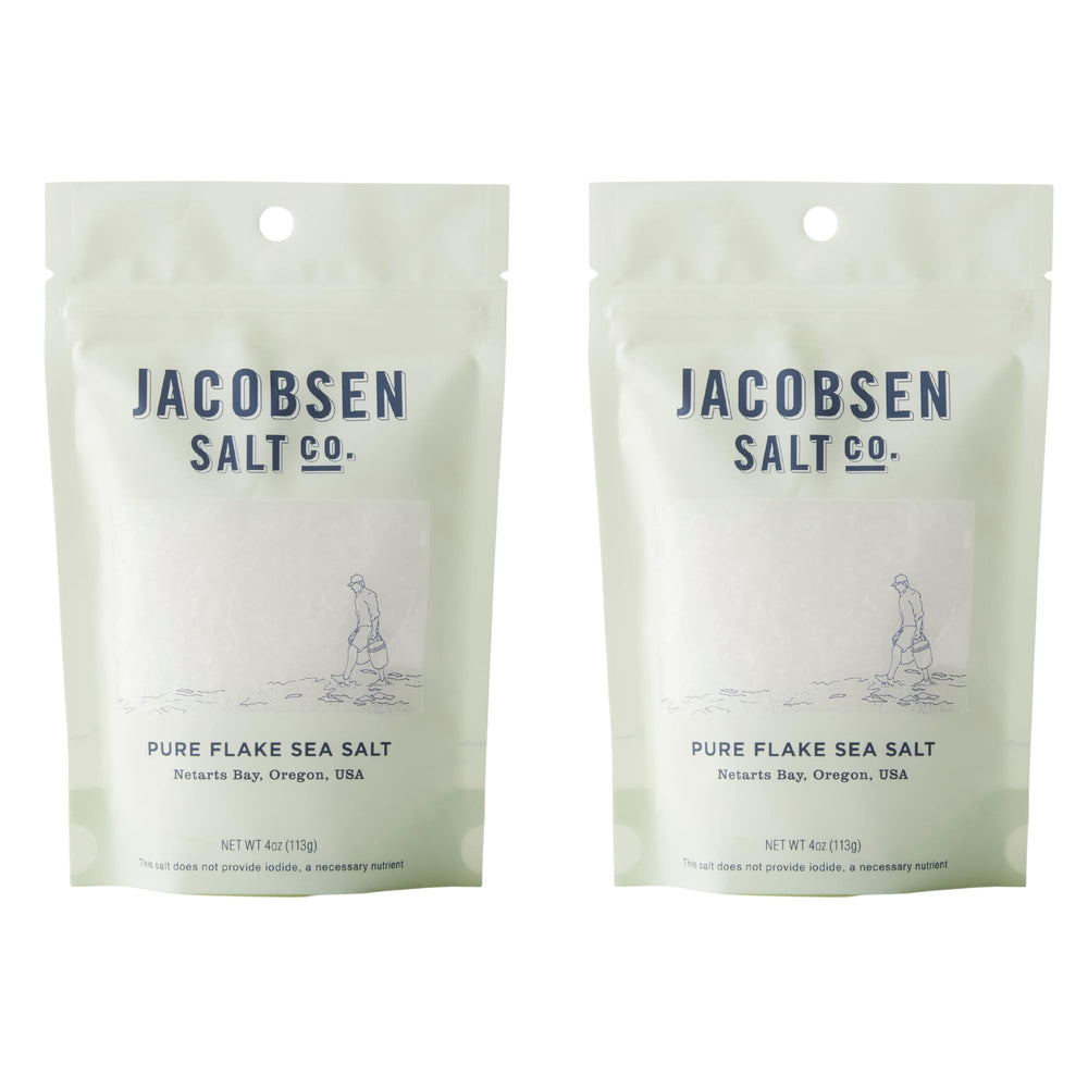 Jacobsen Salt Co. Pure Flake Sea Salt crystals finishing dish for vibrant flavors.