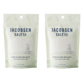 Jacobsen Salt Co. Pure Flake Sea Salt crystals finishing dish for vibrant flavors.