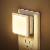JandCase night light in outlet, two-pack, softly guiding nighttime trips.