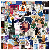 JCQAYB Tayloris music sticker pack on a laptop lid with vivid designs.