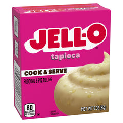 Jell-O Tapioca pudding mix being poured with cold fat-free milk for preparation
