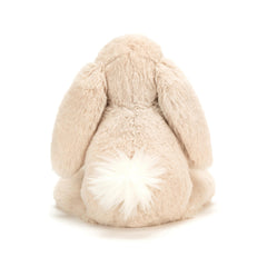 Jellycat Smudge Rabbit's tufted white tail adds charming detail for imaginative moments.