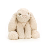 Jellycat Smudge Rabbit medium plush with soft oatmeal fur, ideal for cozy snuggles.