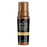 Jergens Instant Sun Mousse bottle front view showing compact self-tanner for natural bronze