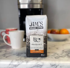 Jim's Organic Hazelnut bag back details roast date and sustainable sourcing for flavor you can trust.