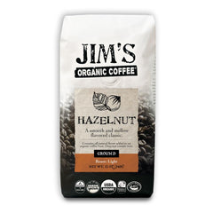 Jim's Organic Coffee Hazelnut bag front highlights aromatic hazelnut flavor for a comforting morning routine.