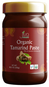 Jiva Organics Tamarind Paste bottle showing rich amber puree for sauces.