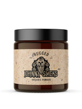 Johnny Slicks Oil Based Pomade jar close-up for sleek, lasting style.