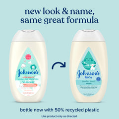 Gently massaging Comfort Touch body lotion on a baby's skin.