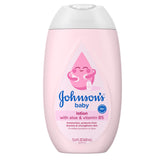 Johnson's Baby Lotion bottle showing coconut oil and Aloe Vera for 72-hour hydration
