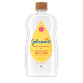 Johnson's Baby Oil bottle closeup, mineral oil for gentle moisture on skin.