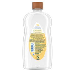 Johnson's Baby Oil with shea and cocoa butter for deep hydration.