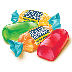 Jolly Rancher candies spilling from a jar on a table