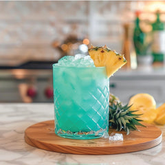 Jordan's Skinny Mixes Mermaid Syrup dispenser demonstrates easy flavoring for any beverage.