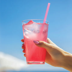 Glass with Jordan's Skinny Mixes Watermelon Lemonade Syrup over ice