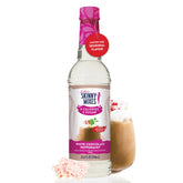 Jordan's Skinny Mixes white chocolate peppermint syrup bottle for festive coffee flavor.